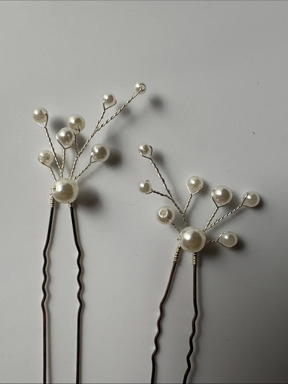 Pearl and silver decorative hair pins